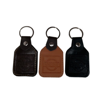 LLAVERO CHICO CUERO NISSAN BEIGE/NEGRO/CAFE