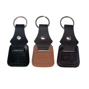 LLAVERO MINI CUERO NISSAN BEIGE/NEGRO/CAFE